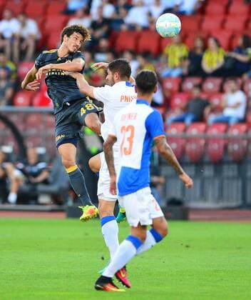 UEFA Europa league Playoff second leg match between Grasshoppers and Fenerbahce at Letzigrund Stadium in Zurich, Swiss on August 25 , 2016. Pictured: Salih Ucan of Fenerbahce and Alban Phishi of Grasshoppers. Not available for publication in Turkey. 