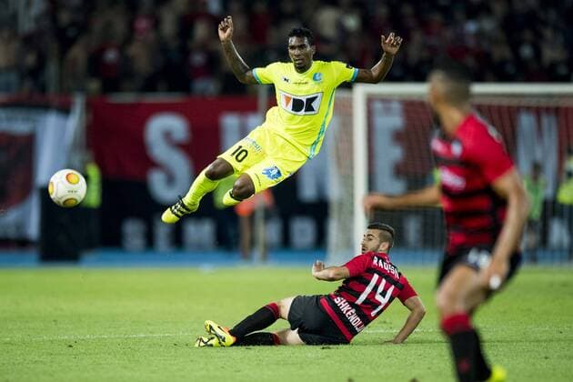 Gent s Renato Neto and Shkendija s Marjan Radeski fight for the ball during a match between Macedonia s Shkendija and Belgian first league soccer team KAA Gent, the return leg of the playoff round in the Europa League competition, Thursday 25 August 2016, in Skopje, Macedonia. First leg ended on a 2-1 result in Belgium. JASPERxJACOBS  x04918757x