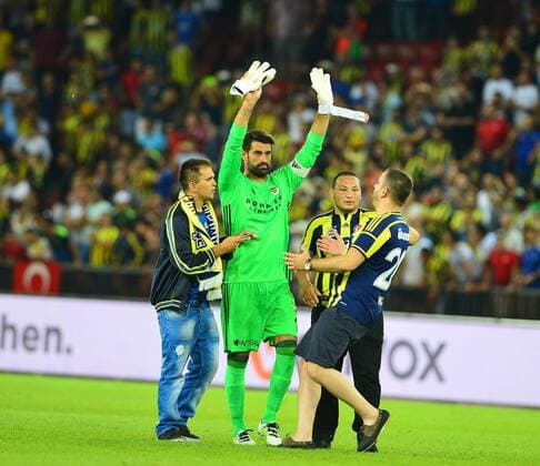 UEFA Europa league Playoff second leg match between Grasshoppers and Fenerbahce at Letzigrund Stadium in Zurich, Swiss on August 25 , 2016. Final Score: Grasshoppers 0 - Fenerbahce 2 Pictured:At the end of the game , Fenerbahce fans entered to the pitch in order to get a shirt of footballers of their teams. ( Goalkeeper Volkan Demirel ) Not available for publication in Turkey. 