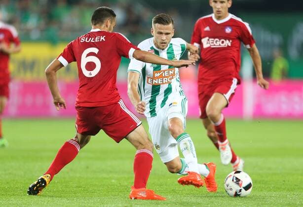 SOCCER - UEFA EL quali, Rapid vs Trencin VIENNA,AUSTRIA,25.AUG.16 - SOCCER - UEFA Europa League, Play-off qualification, SK Rapid Wien vs FK AS Trencin. Image shows Martin Sulek (Trencin) and Arnor Ingvi Traustason (Rapid). Keywords: Wien Energie. GEPAxpictures xPhilippxBrem