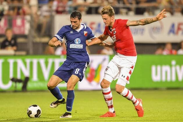 (L-R) Darko Puskaric of FK Vojvodina, Wout Weghorst of AZ Alkmaarduring the Europa League match between AZ and FK Vojvodina on august 25, 2016 at the AFAS Stadium in Alkmaar, the Netherlands AZ v FK Vojvodina Europa League 2016 2017 xVIxGerritxvanxKeulenxIVx 6100185