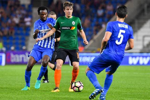 Genk s Bennard Kumordzi and Lokomotivo s Herdi Prenga fight for the ball during a match between Belgian first league team KRC Genk and Croatian Lokomotiva Zagreb, the return leg of the playoff round in the Europa League competition, in Genk, Thursday 25 August 2016. First leg ended on 2-2 draw result in Croatia. LUCxCLAESSEN  x04918937x
