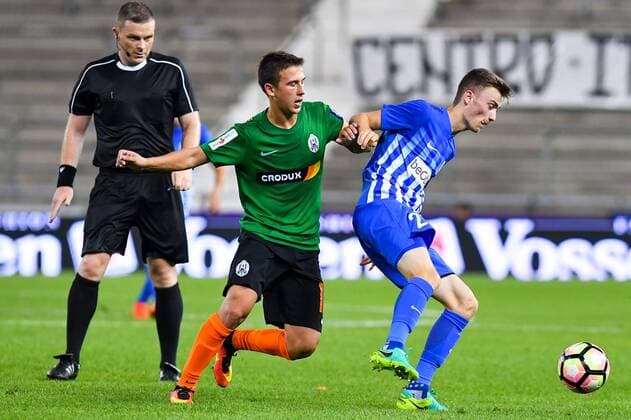 Genk s Brian Heynen fight for the ball during a match between Belgian first league team KRC Genk and Croatian Lokomotiva Zagreb, the return leg of the playoff round in the Europa League competition, in Genk, Thursday 25 August 2016. First leg ended on 2-2 draw result in Croatia. LUCxCLAESSEN  x04918940x