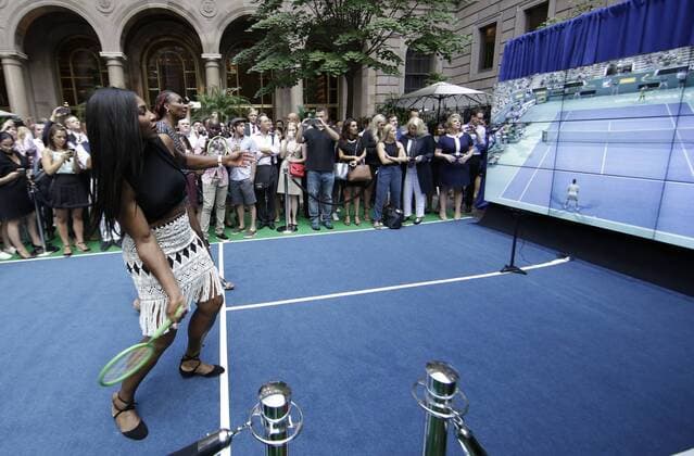 Tennis players Serena Williams and Venus Williams participate in a Virtual Tennis Tournament at Lotte New York Palace on August 25, 2016 in New York City. The US Open Tennis Championships begin on Monday.  NYP20160825104 JOHNxANGELILLO