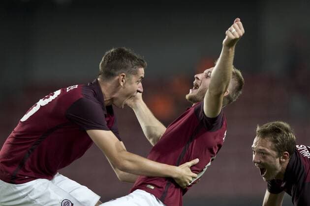 Ondrej Zahustel, from left, Jakub Brabec and Lukas Julis of Sparta celebrate a goal during the fourth qualifying round return Europa League return match Sparta Praha vs Sonderjyske in Prague, Czech Republic, August 25, 2016. (CTKxPhoto MichalxKamaryt) CTKPhotoP201608251122001  kmt 12