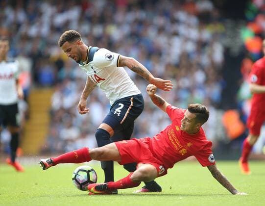 Tottenham s Kyle Walker tussles with Liverpool s Philippe Coutinho during the Premier League match at White Hart Lane Stadium, London. Picture date August 27th, 2016 Pic David Klein Sportimage EDITORIAL USE ONLY. No use with unauthorised audio, video, data, fixture lists, club league logos or live services. Online in-match use limited to 120 images, no video emulation. No use in betting, games or single club league player publications.