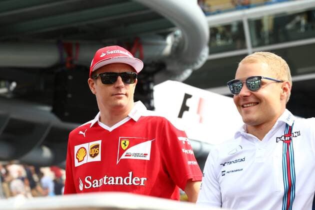Italian Grand Prix, Monza 01 - 04 September 2016 04.09.2016 - Kimi Raikkonen (FIN) Scuderia Ferrari SF16-H and Valtteri Bottas (FIN) Williams FW38 at drivers parade 