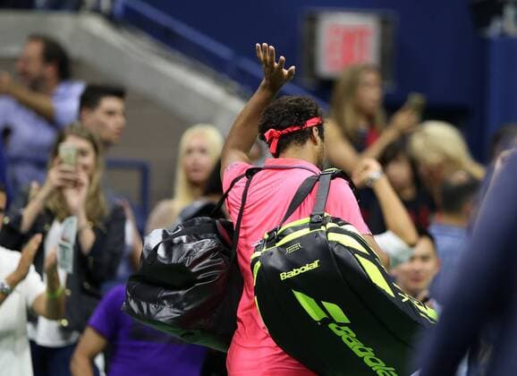 NEW YORK, Sept. 6, 2016 -- Jo-Wilfried Tsonga of France leaves the court after retired from his men s singles quarter-final match against Novak Djokovic of Serbia at the 2016 U.S. Open in New York, the United States, Sept. 6, 2016. ) (SP)U.S.-NEW YORK-TENNIS-U.S. OPEN QinxLang 