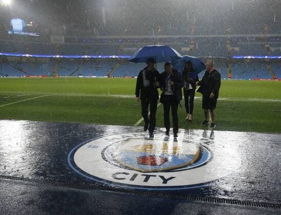 13.09.2016. The Etihad, Manchester, England. UEFA Champions League Football. Manchester City versus Borussia Monchengladbach. The officials inspect the pitch surface as torrential rain before the kick off forces the game to be postponed. xAlanxMartinx  ActionPlus11788848