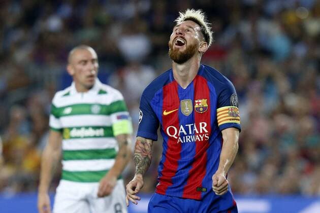 (160914) -- BARCELONA, Sept. 13, 2016 -- Barcelona s Lionel Messi (R) reacts during the UEFA Champions League Group C match between Barcelona and Celtic in Barcelona, Sept. 13, 2016. Barcelona won 7-0. ) (SP)SPAIN-BARCELONA-SOCCER-UEFA CHAMPIONS LEAGUE-GROUP C PauxBarrena 