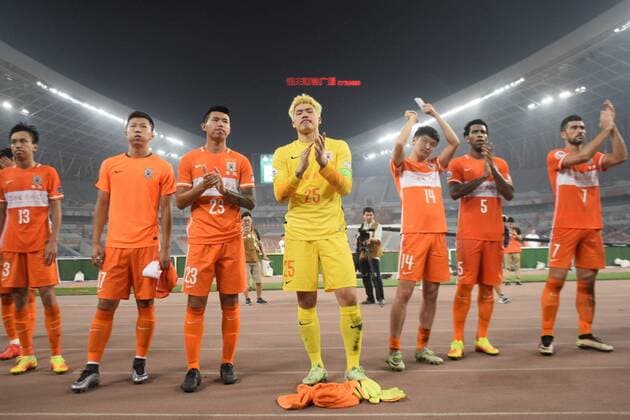JINAN, CHINA - SEPTEMBER 14: Wang Dalei 25 and team players of Shandong Luneng thank to audience after the quarter final match of the AFC Champions League between Shandong Luneng and FC Seoul at Olympic Sports Centre on September 14, 2016 in Jinan, Shandong Province of China.  CFP492016952 
