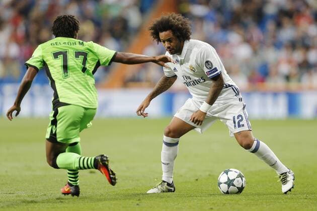 Real Madrid s defender Marcelo and Sporting s forward Gelson Martins during Champions League match on September 14, 2016 at Santiago Bernabeu Stadium in Madrid, Spain. Photo: Cesar Cebolla ALFAQUI 