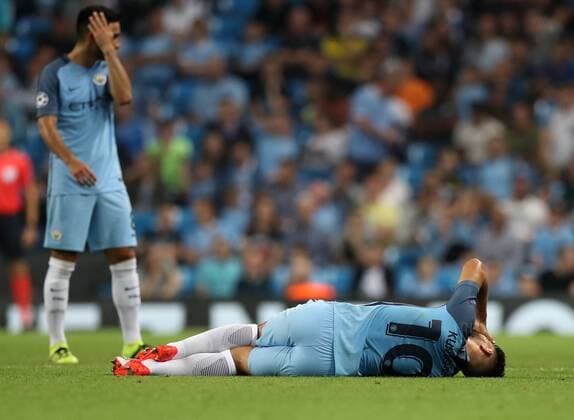 Football - 2016 2017 Champions League - Group C : Manchester City v Borussia Monchengladbach - The Etihad Stadium Sergio Aguero of Manchester City lies injured during the match between Manchester City and Borussia Monchengladbach at The Etihad Stadium COLORSPORT LYNNE CAMERON 