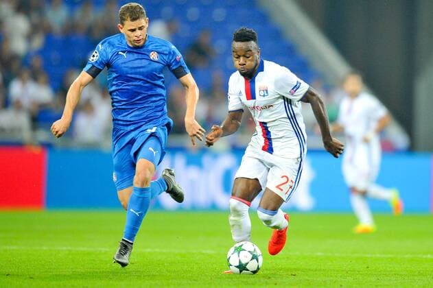 27 Maxwel Cornet (ol) - 05 Jonas (zag) - Fussball, Champions League, Olympique Lyon vs. Dynamo Zagreb - 14 09 2016 FEP Panoramic 