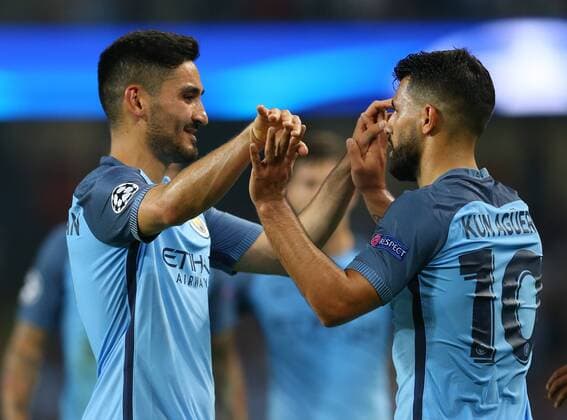 Ilkay Gundogan of Manchester City celebrates with Sergio Aguero of Manchester City during the UEFA Champions League Group C match at The Etihad Stadium, Manchester. Picture date: September 14th, 2016. Pic Simon Bellis Sportimage EDITORIAL USE ONLY. No use with unauthorised audio, video, data, fixture lists, club league logos or live services. Online in-match use limited to 120 images, no video emulation. No use in betting, games or single club league player publications.