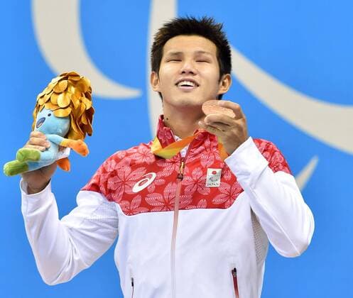 Japan s Kimura wins 4th medal of Rio Paralympics Japan s Keiichi Kimura celebrates with the bronze medal he won in the men s 100-meter freestyle S11 class for visually impaired swimmers at the Rio de Janeiro Paralympics on Sept. 15, 2016. It was his fourth medal of the Rio Games. 