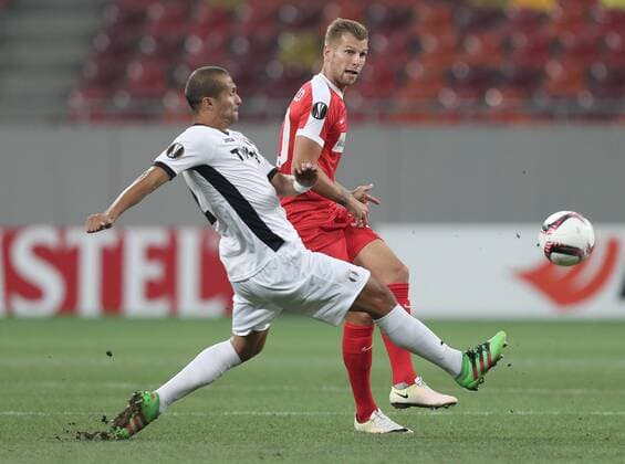 SOCCER - EL, Giurgiu vs A.Wien BUCHAREST,ROMANIA,15.SEP.16 - SOCCER - UEFA Europa League, group stage, Astra Giurgiu vs FK Austria Wien. Image shows Geraldo Alves (Astra Giurgiu) and Alexander Gruenwald (A.Wien). GEPAxpictures xChristianxOrt