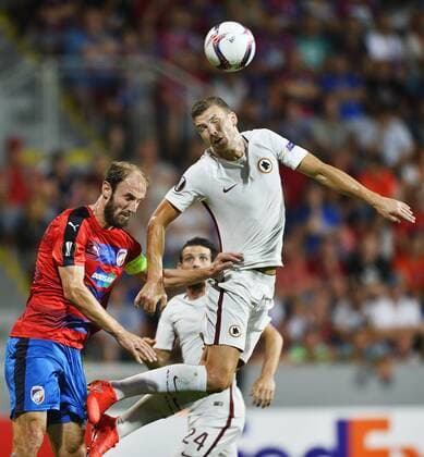 Roman Hubnik of Viktoria Pilsen, left, and Edin Dzeko of As Roma, right, in action during the UEFA Europe League, group E, 1st round match FC Viktoria Plzen vs AS Roma, in Pilsen, Czech Republic, on Thursday, September 15, 2016. (CTKxPhoto MiroslavxChaloupka) CTKPhotoP201609151030801 CHA 11