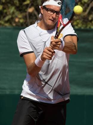 World group , play-off play-off round Uzbekistan Vs Switzerland (IN WHITE )Denis ISTOMIN from uzb - (in red )Antoine BELLIER frome swis 