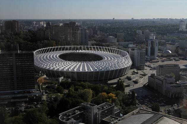 September 15, 2016 - Kiev, Ukraine - A NSK Olimpiyskyi stadium bowl is seen over the Kyivs city buildings. Ukrainian capital Kyiv city has been selected to host the 2018 UEFA Champions League final, the first European Cup decider to be held in Ukraine. The decision was taken at Thursday s UEFA Executive Committee meeting in Athens, September 15, 2016. Kyiv to host 2018 Champions League final  - ZUMAn230