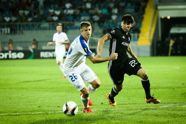 UEFA: Qarabag FK - Slovan Liberec Qarabag FK Afran Ismayilov (R) is challenged by Slovan Liberec Lukas Bartosak (L) during the UEFA Europa League group J football match Qarabag vs Slovan Liberec at Dalga Arena stadium. The final score is 2-2.  AzizxKarimovx xPacificxPress