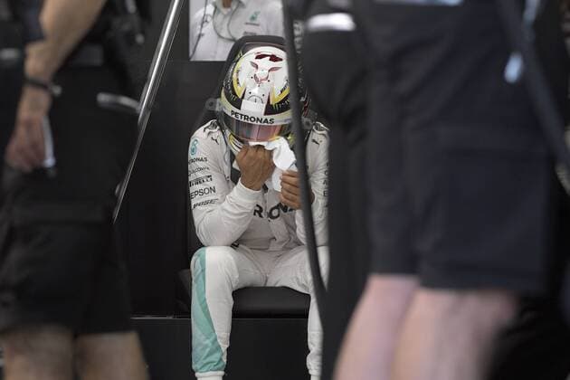 (160916) -- SINGAPORE, Sept. 16, 2016 -- Mercedes driver Lewis Hamilton of Britain reacts during the first free practice session on Day 1 of 2016 Singapore F1 Grand Prix Night Race, Sept. 16, 2016. ) (SP)SINGAPORE-F1-GRAND PRIX NIGHT RACE-DAY 1 ThenxChihxWey 