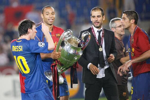 May 28, 2009 - Rome, Russia - The Barcelona FC coach Pep Guardiola is set to leave Barcelona when his contract expires at the end of the season, according to reports from Spain...Pictured: May 27,2009. Rome,Italy. The Stadio Olimpico, UEFA Champions League final Barselona FC vs Manchester United ManU 2:0. Barselona FC head coach Pep Guardiola (C)and FC Barselona forward Lionel Messi (l) with UEFA Cup. Guardiola to leave Barcelona at the end of the season - ZUMAx01_