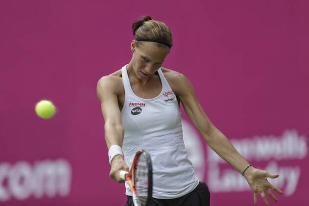 Viktorija Golubic of Switzerland returns a shot to Anett Kontaveit of Estonia during their women s singles quarter-final match of the WTA Tennis Damen Guangzhou Open 2016 in Guangzhou city, south China s Guangdong province, 22 September 2016. Anett Kontaveit defeated Viktorija Golubic 2-1. Anett Kontaveit eliminates Viktorija Golubici to advance to semi-final at WTA Guangzhou Open  pbu507770_04