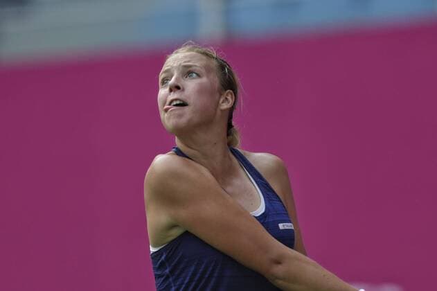 Anett Kontaveit of Estonia reacts as she prepares to return a shot to Viktorija Golubic of Switzerland during their women s singles quarter-final match of the WTA Tennis Damen Guangzhou Open 2016 in Guangzhou city, south China s Guangdong province, 22 September 2016. Anett Kontaveit defeated Viktorija Golubic 2-1. Anett Kontaveit eliminates Viktorija Golubici to advance to semi-final at WTA Guangzhou Open  pbu507770_06