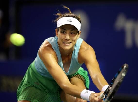 September 22, 2016, Tokyo, Japan - Garbine Muguruza of Spain returns the ball against Latvia s Anastasija Sevastova during the second round of the Toray Pan Pacific Open tennis championships in Tokyo on Thursday, September 22, 2016. Muguruza defeated Sevastova 6-3, 6-3. Noxthirdxpartyxsales  (lwxa004787)