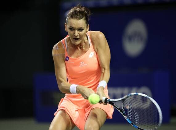September 23, 2016, Tokyo, Japan - Agnieszka Radwanska of Poland returns the ball against Rio de Janeiro Olympics gold medalist Monica Puig of Puerto Rico during the quarter finals of the Toray Pan Pacific Open tennis championships in Tokyo on Friday, September 23, 2016. Radwanska defeated Puig 6-2, 6-3.  (lwxa004841)