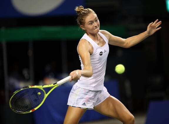 September 23, 2016, Tokyo, Japan - Aliaksandra Sasnovich of Belarus returns the ball against Japan s Naomi Osaka during the quarter finals of the Toray Pan Pacific Open tennis championships in Tokyo on Friday, September 23, 2016. Osaka defeated Sasnovich 6-3, 7-6.  (lwxa004861)