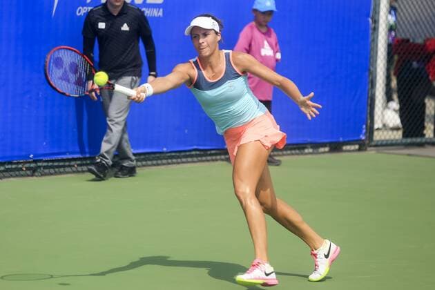 WUHAN, CHINA - SEPTEMBER 23: Tatjana Maria of Germany returns a shot against Kateryna Bondarenko of the Ukraine during the qualifying match of 2016 WTA Tennis Damen Dongfeng Motor Wuhan Open at Optics Valley International Tennis Center on September 23, 2016 in Wuhan, China.  CFP492556013 