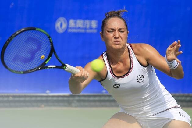 WUHAN, CHINA - SEPTEMBER 23: Kateryna Bondarenko of the Ukraine returns a shot against Tatjana Maria of Germany during the qualifying match of 2016 WTA Tennis Damen Dongfeng Motor Wuhan Open at Optics Valley International Tennis Center on September 23, 2016 in Wuhan, China.  CFP492556014 