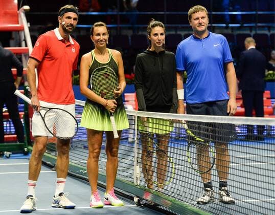 ST PETERSBURG, RUSSIA â€“ SEPTEMBER 25, 2016: Goran Ivanisevic and Iva Majoli of Croatia, Anastasia Myskina and Yevgeny Kafelnikov of Russia (L-R) pose for a photo ahead of a mixed doubles match as part of the world tennis legends show at the 2016 St. Petersburg Open. Andrei Ivanov TASS  TS03257E