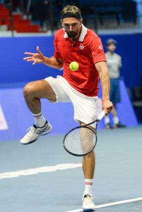 ST PETERSBURG, RUSSIA â€“ SEPTEMBER 25, 2016: Goran Ivanisevic of Croatia returns the ball in a mixed doubles match against Anastasia Myskina and Yevgeny Kafelnikov of Russia as part of the world tennis legends show at the 2016 St. Petersburg Open. Andrei Ivanov TASS  TS032582