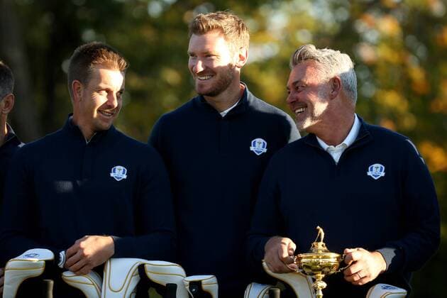 GOLF - Ryder Cup 2016 CHASKA,MINNESOTA,USA,27.SEP.16 - GOLF - Ryder Cup, Hazeltine National Golf Club. Image shows Henrik Stenson (SWE), Chris Wood (ENG) and captain Darren Clarke (IRL). GEPAxpictures xDanielxGoetzhaber