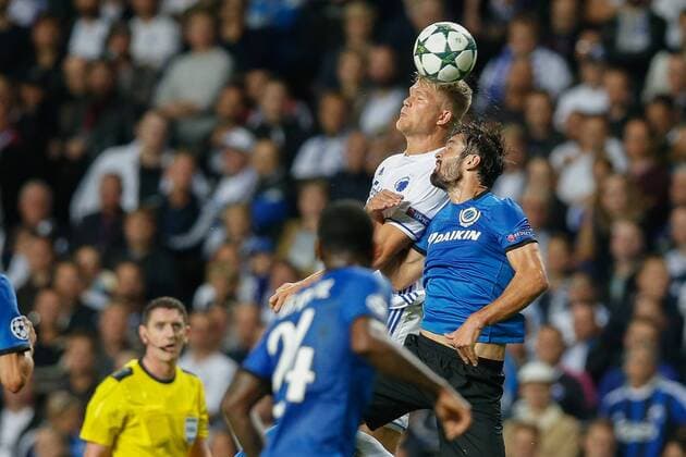 Kobenhavn s Andreas Cornelius and Club s Benoit Poulain fight for the ball during a soccer game between Danish club F.C. Kobenhavn and Belgian team Club Brugge KV in Copenhagen, Denmark, Tuesday 27 September 2016, the second game in the group stage of the UEFA Champions League competition, in group G. BRUNOxFAHY  x04941946x