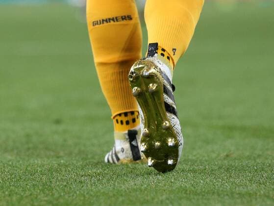 Arsenal s Mesut Ozil shows off his gold boots whilst missing a stud during the Champions League group A match at the Emirates Stadium, London. Picture date September 28th, 2016 Pic David Klein Sportimage EDITORIAL USE ONLY. No use with unauthorised audio, video, data, fixture lists, club league logos or live services. Online in-match use limited to 120 images, no video emulation. No use in betting, games or single club league player publications.