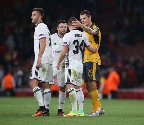 Arsenal s Granit Xhaka embraces brother Taulant Xhaka of Basel at the final whistle during the Champions League group A match at the Emirates Stadium, London. Picture date September 28th, 2016 Pic David Klein Sportimage EDITORIAL USE ONLY. No use with unauthorised audio, video, data, fixture lists, club league logos or live services. Online in-match use limited to 120 images, no video emulation. No use in betting, games or single club league player publications.