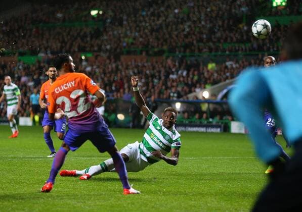 Moussa Dembele of Celtic scores their third goal during the Champions League Group C match at the Celtic Park Stadium, Glasgow. Picture date: September 28th, 2016. Pic Simon Bellis Sportimage EDITORIAL USE ONLY. No use with unauthorised audio, video, data, fixture lists, club league logos or live services. Online in-match use limited to 120 images, no video emulation. No use in betting, games or single club league player publications.