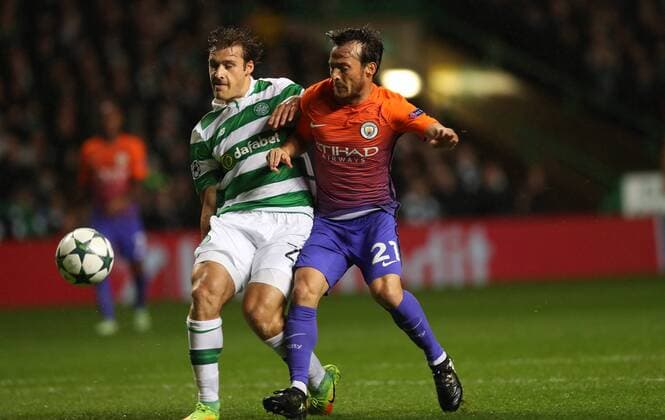 Football - 2016 2017 Champions League - Group C: Celtic vs Manchester City at Celtic Park Erik Sviatchenko of Celtic and David Silva of Manchester City COLORSPORT LYNNE CAMERON 