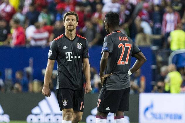 Bayern Munich s Xabi Alonso and David Alaba during the match of Group stage of Champions League Atletico de Madrid and Bayern Munich at Vicente Calderon Stadium in Madrid. September 28, 2016.  (20160928088)