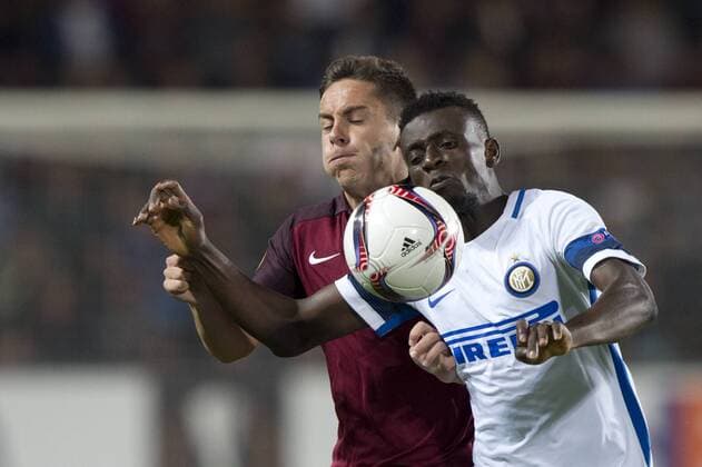 From left: Daniel Holzer of Sparta and Assane Gnoukouri of Milan in action during the European Football League second round group K match, Sparta Praha vs Inter Milan in Prague, Czech Republic, September 29, 2016. (CTKxPhoto MichalxKamaryt) CTKPhotoP201609291013701  kmt 13