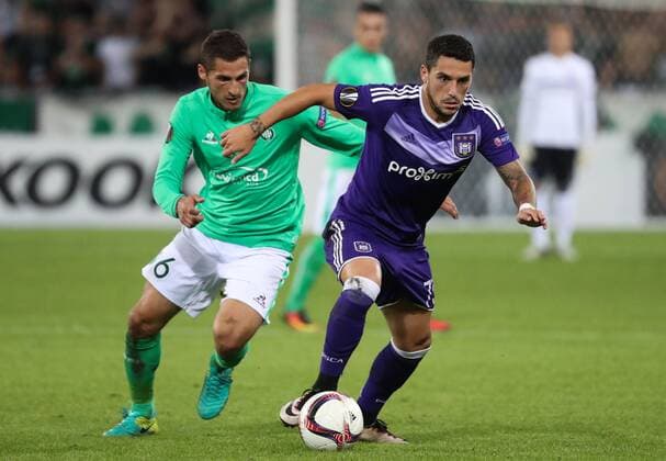 Saint-Etienne s Jeremy Clement and Anderlecht s Nicolae-Claudiu Stanciu fight for the ball during a game on the second day of the group stage (group C) of the UEFA Europa League competition between French club AS Saint-Etienne and Belgian soccer team RSC Anderlecht in Saint-Etienne, France, Thursday 29 September 2016. VIRGINIExLEFOUR  x04943971x
