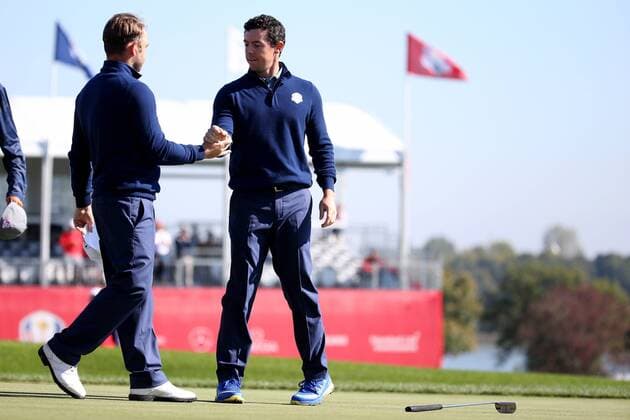GOLF - Ryder Cup 2016 CHASKA,MINNESOTA,USA,30.SEP.16 - GOLF - Ryder Cup, Hazeltine National Golf Club. Image shows Andy Sullivan (ENG) and Rory Mcilroy (IRL). GEPAxpictures xDanielxGoetzhaber