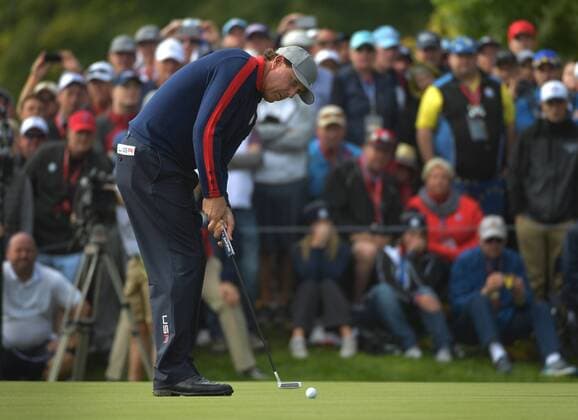 USA team member Phil Mickelson putts on the 12th green during day 1 of the 2016 Ryder Cup at Hazeltine National Golf Club in Chaska, Minnesota on September 30, 2016.  MIN20160930325 KEVINxDIETSCH