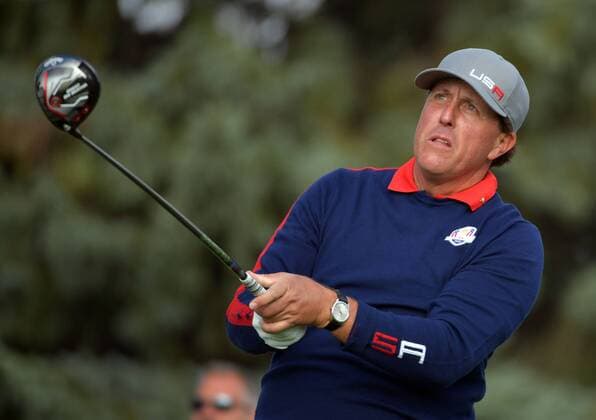USA team member Phil Mickelson watches his shot off of the 12th tee during day 1 of the 2016 Ryder Cup at Hazeltine National Golf Club in Chaska, Minnesota on September 30, 2016.  MIN20160930329 KEVINxDIETSCH