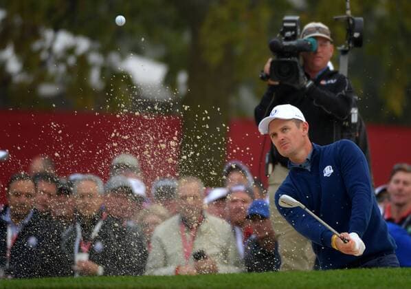European team member Justin Rose hits out of a bunker on the 6th hole on day 1 of the 2016 Ryder Cup at Hazeltine National Golf Club in Chaska, Minnesota on September 30, 2016.  MIN20160930342 KEVINxDIETSCH