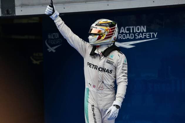 (161001) -- SEPANG, Oct. 1, 2016 -- Mercedes AMG Petronas F1 Team s British driver Lewis Hamilton celebrates taking pole position during the qualifying session of the Formula One Malaysian Grand Prix in Sepang, Malaysia, Oct. 1, 2016. ) (SP)MALAYSIA-SEPANG-F1-MALAYSIAN GRAND PRIX-PRACTICE ChongxVoonxChung 